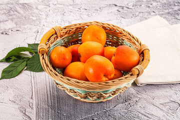 Raw ripe sweet apricots heap