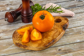 Organic juicy ripe yellow tomatoes