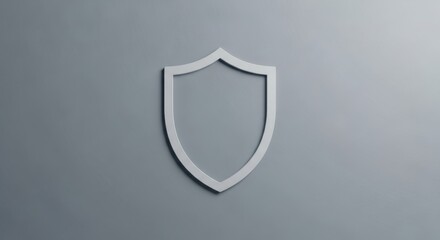 Minimal silver shield icon on grey background symbolizing protection