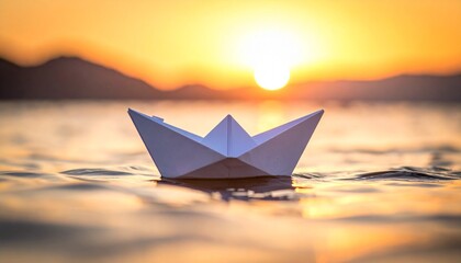 A white paper boat floats on golden water at sunset, cradling a crumpled note—evoking simplicity, reflection, and the poetic rhythm of quiet imagination.