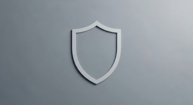 Minimal silver shield icon on grey background symbolizing protection