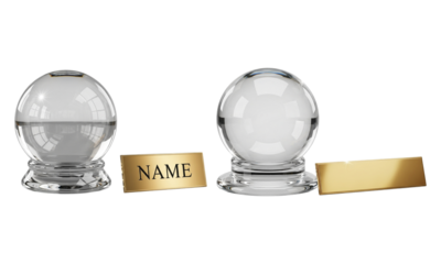 Crystal ball with coin slot and blank nameplate next to clear sphere, text
