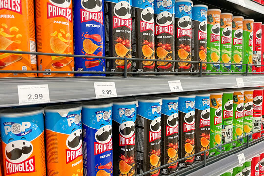 Bar, Montenegro, 22 August 2025, Pringles potato chips on shelf in grocery store