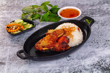 Spicy roasted chicken wing with rice