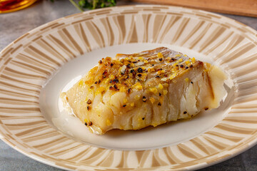 Steamed cod fish fillet with spices