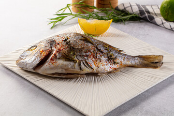 Baked dorada fish with spices
