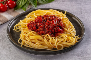 Italian pasta spaghetti bolognese with minced beef meat and tomato sauce