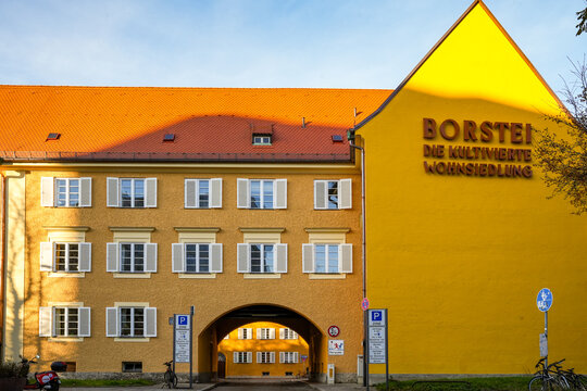 Borstei residential building in Munich with distinctive yellow facade