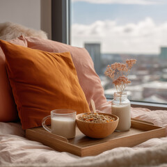 Healthy breakfast in bed with granola and urban city view.