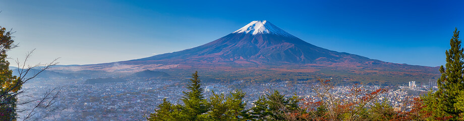 Fototapeta premium Travel Concepts. Picturesque Fuji Mountain with Kyoto City With Houses in Foregound in Japan