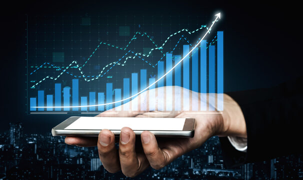 A hand presenting a smartphone with financial graphs and data visualizations in the background, symbolizing growth, analysis, and modern technology. Impute