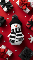 Snowman surrounded by colorful wrapped boxes and bows.
