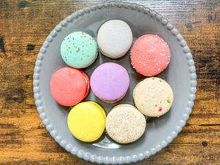 Colorful Macarons on Gray Plate