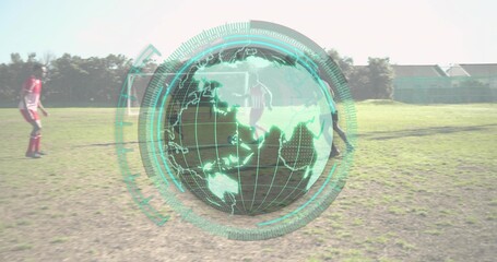 Running eight soccer players in soccer kit across grass field, with globe overlay and soccer ball