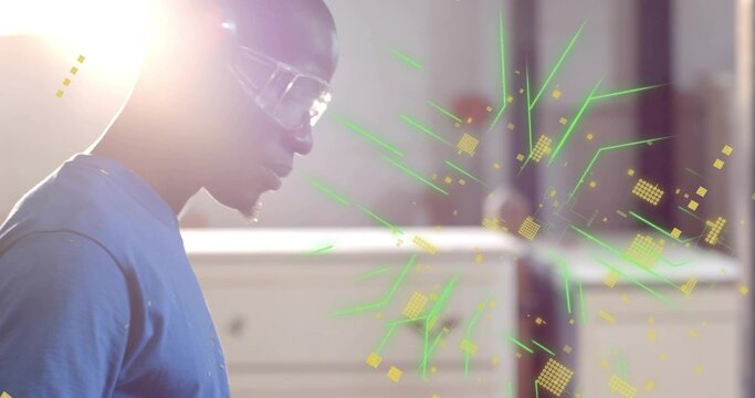 Technician wearing protective goggles examining floating holographic interface in lab, copy space