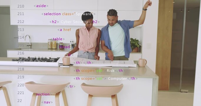 Standing Hispanic man and African American woman studying blueprint at kitchen island with stools