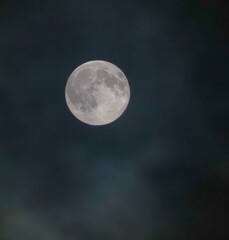 full moon over blue sky