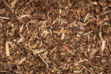 Brown wood mulch background texture