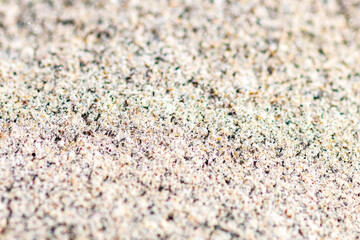 Abstract background of a stone surface with green and red stripes, macro
