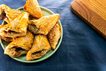 Puff pastry triangles with jam. Baking. Food concept.