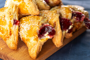 Puff pastry triangles with jam. Baking. Food concept.