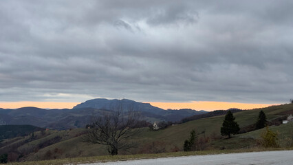 Mountain Landscape under Cloudy Sky in Autumn