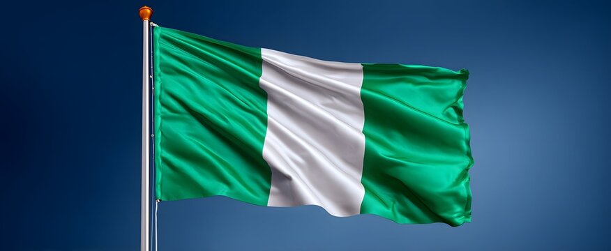The Nigerian national flag dances like a lively symphony in vibrant colors and symbols.