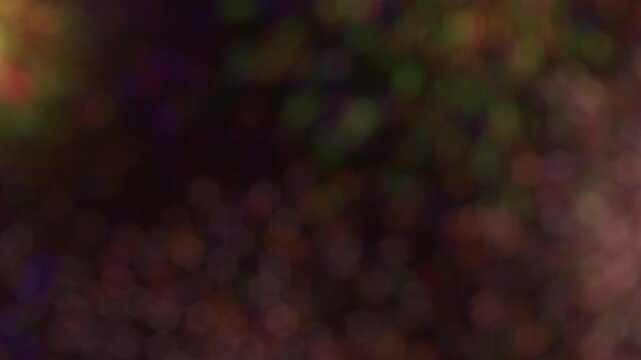 Out of Focus Bokeh Fireworks with Various Different Colors Exploding on Black Background. Used for 4th July Independence Day, New Years Celebrations. Particle Simulation Animation ProRes.