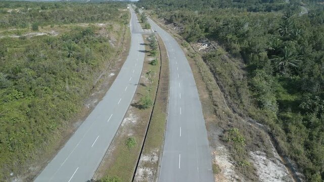 Beautiful Aerial Drone View At Matang Fac Highway This Road Lead to Sempadi Costal Road,Facing Green Forest And Mount Serapi Kuching,Borneo.