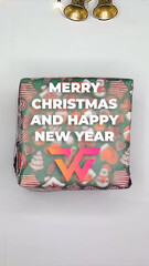 Santa Claus Hands Gift Christmas Vertical Logo Reveal | Festive Holiday Greeting Animation