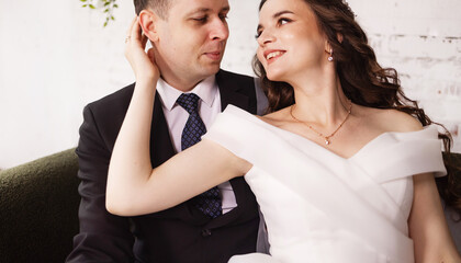Portrait of a beautiful bride and groom at their wedding day.
