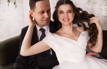 Portrait of a beautiful bride and groom at their wedding day.