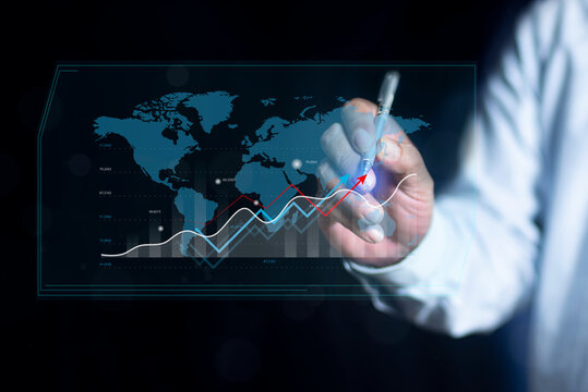 Businessman analyzing financial growth digital business charts and map interface. Business and Financial technology backgrounds. financial or business concept