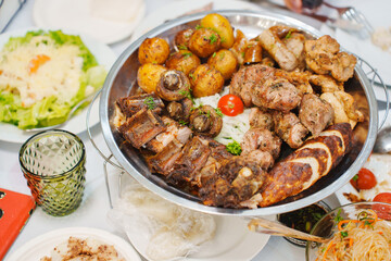 Delicious platter of grilled meats and vegetables served
