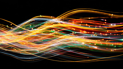 Colorful light streaks flowing across a dark background multiple bright dynamic lines creating a vivid abstract visual effect with motion blur and glowing particles