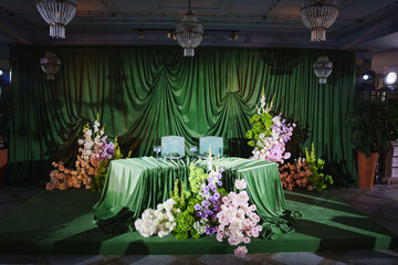 Elegant floral setup at an indoor event venue