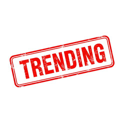 Red distressed grunge stamp with the word trending isolated on transparent background