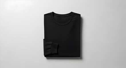 Classic black long sleeve shirt folded on a clean white background creates a modern apparel template, ready for your designs and branding, sleek and stylish!
