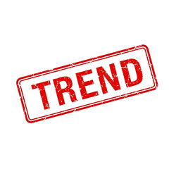 Red distressed grunge stamp with the word trend isolated on transparent background