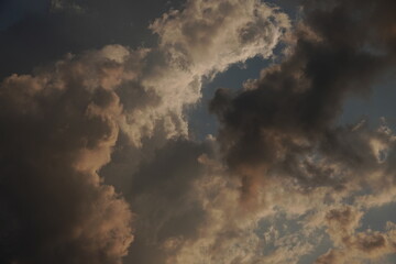 dramatic sky with clouds at sunset