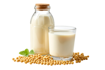 Glass of fresh soy milk next to a bottle and soybeans 