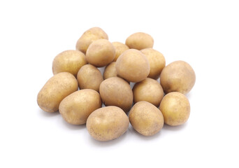 Heap of raw baby potatoes on white background