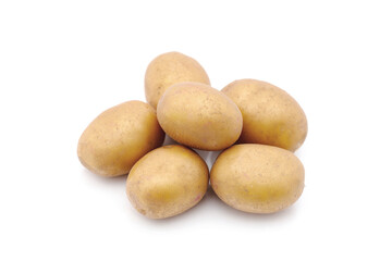 Heap of raw baby potatoes on white background