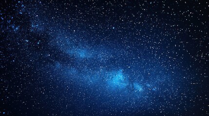 A starry night sky filled with twinkling stars and a bright, milky way-like galaxy, with a few distant galaxies visible in the distance. 