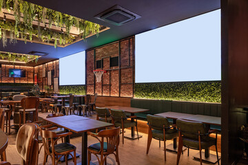 Warm sports café interior with brick décor and numerous TV displays