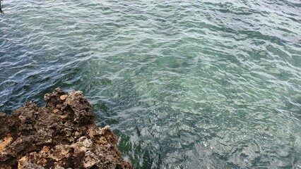 Crystal Clear Ocean Water by the Rocks