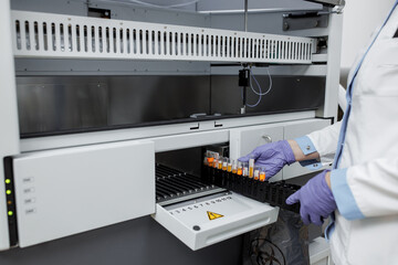 laboratory for research of tests, the doctor loads into the research device