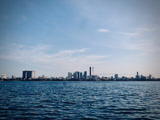 Modern City Skyline Across Wide Lake on West Lake in Hanoi, Vietnam