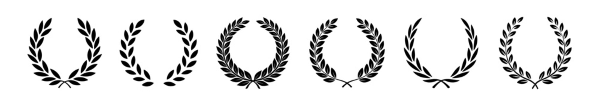 Black laurel wreath award icons set on transparent background