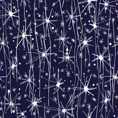 Hand drawn white abstract snowflakes on a blue backgrownd. Whiner seamless vector pattern.